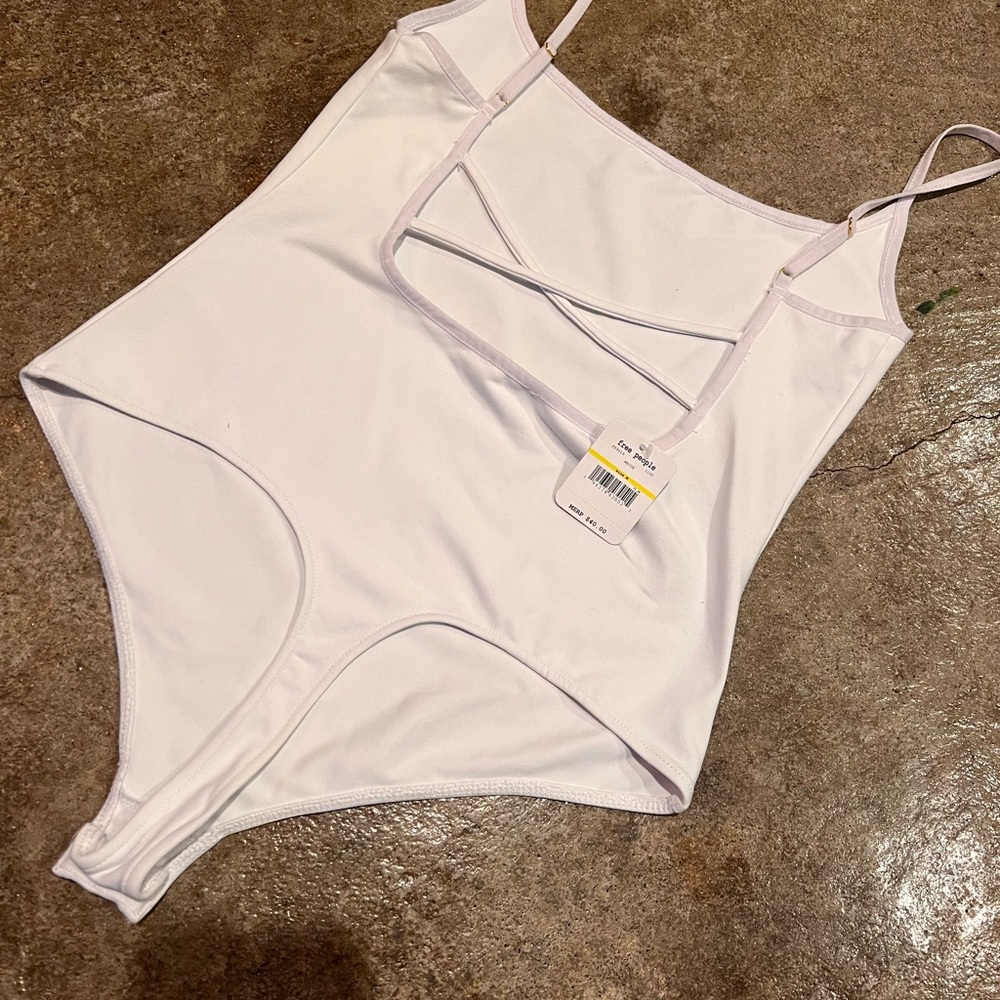 New with rage free people body suit